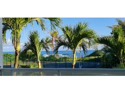 location Maison Villa Guadeloupe - vue mer depuis terrasse  gauche