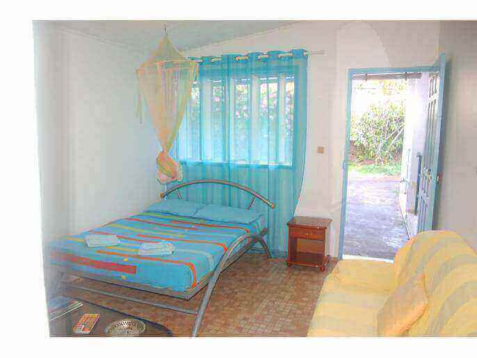 Location VillaMaison/Appartement en Guadeloupe - lit et canap