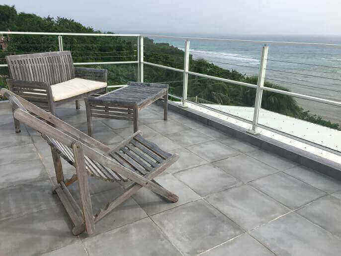 Location VillaMaison en Guadeloupe - Terrasse ouverte  l'tage avec sa pleine vue mer 